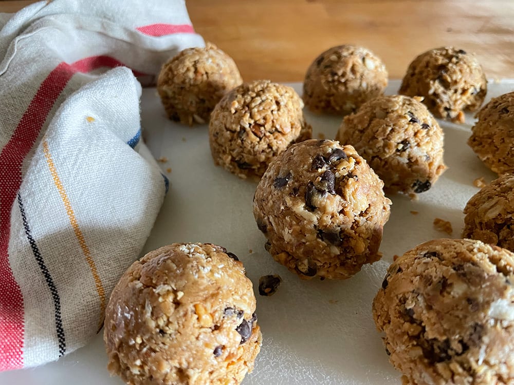 granola balls with towl next to it | Dockside Cannabis